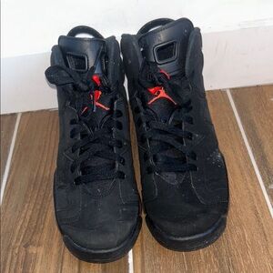 Black Air Jordan Sneakers with Red Accents